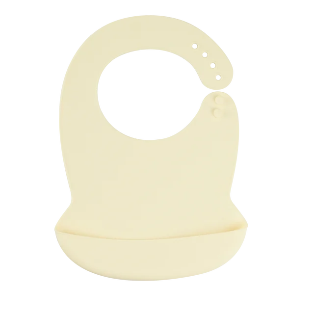 Adjustable, soft cream silicone baby bib with a deep food-catching pocket.