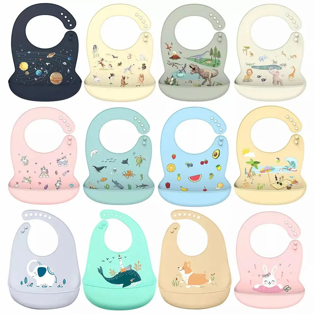 Twelve colorful silicone baby bibs with adjustable neckbands and food-catching pockets, featuring various cute animal and space designs.