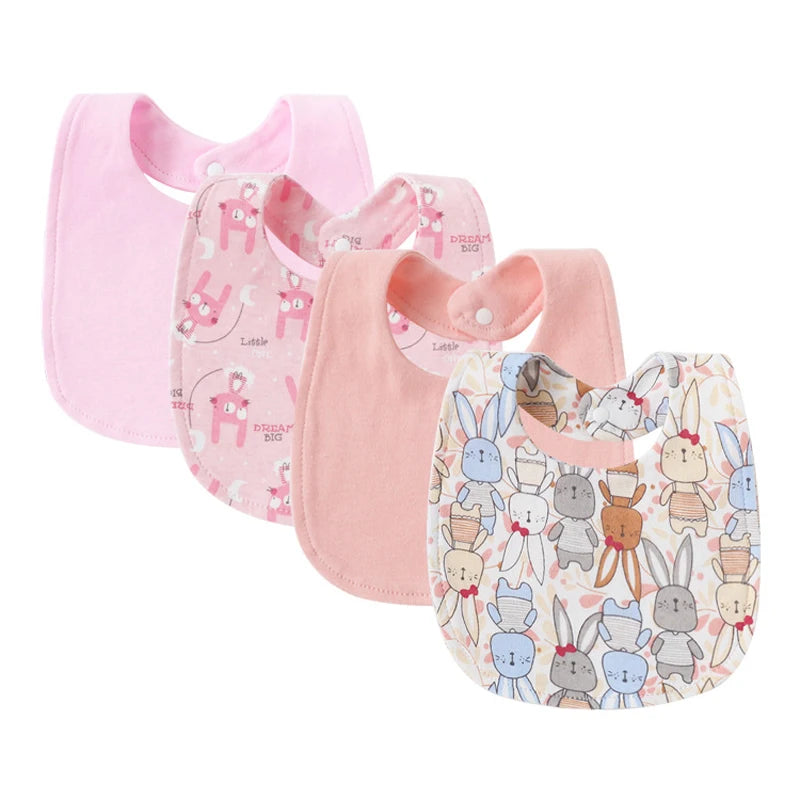 Set of 4 pink cotton baby bibs: two solid pink, one with pink cartoon bunnies, and one with colorful cartoon bunnies.