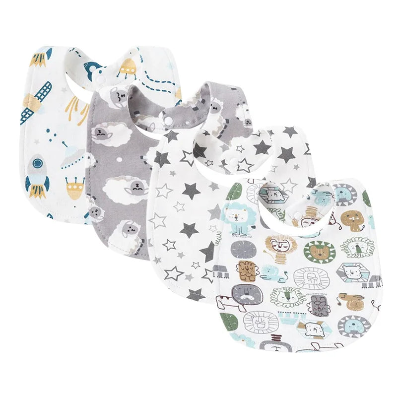 Set of 4 white and gray cotton baby bibs with cartoon space, sheep, stars, and lion patterns.