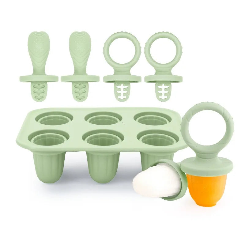 Green silicone baby popsicle mold with six cavities and four reusable handles, plus a fruit feeder.