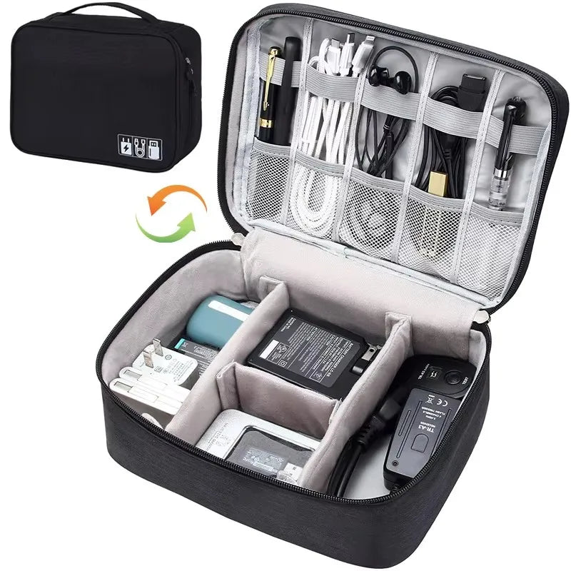 Black waterproof electronic organizer bag, open to show cables, chargers, and accessories in compartments.
