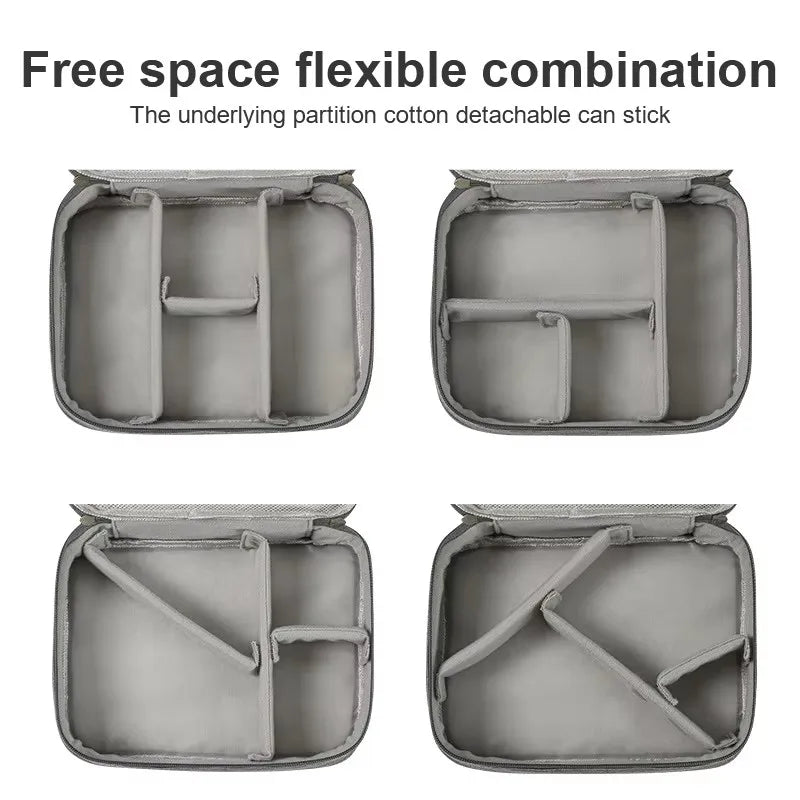 Gray oxford fabric travel organizer with flexible, detachable compartments for electronics.