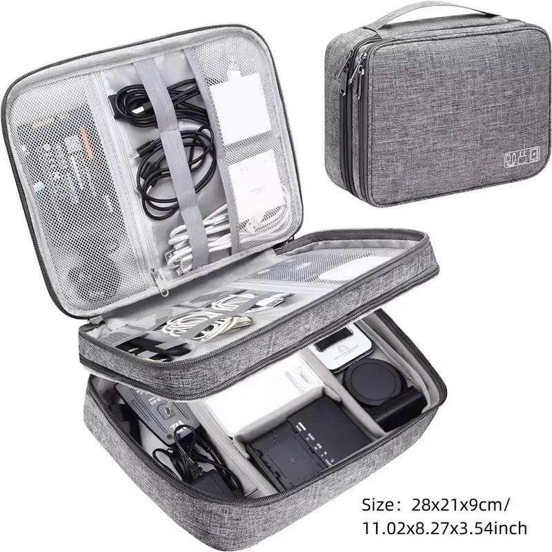 Gray waterproof Oxford fabric travel organizer for cables, chargers, and electronics, with multiple mesh pockets and compartments.