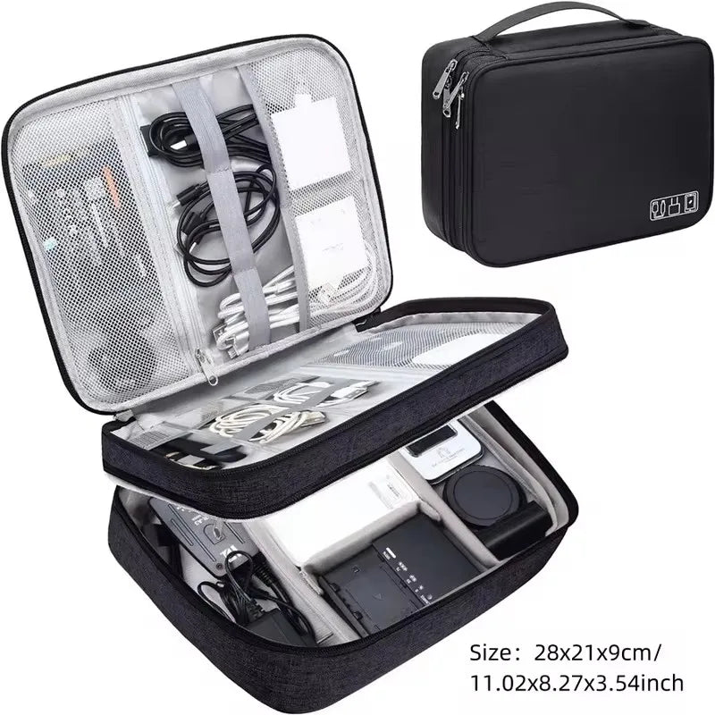 Black waterproof oxford fabric travel organizer for cables and electronics, with multiple compartments.