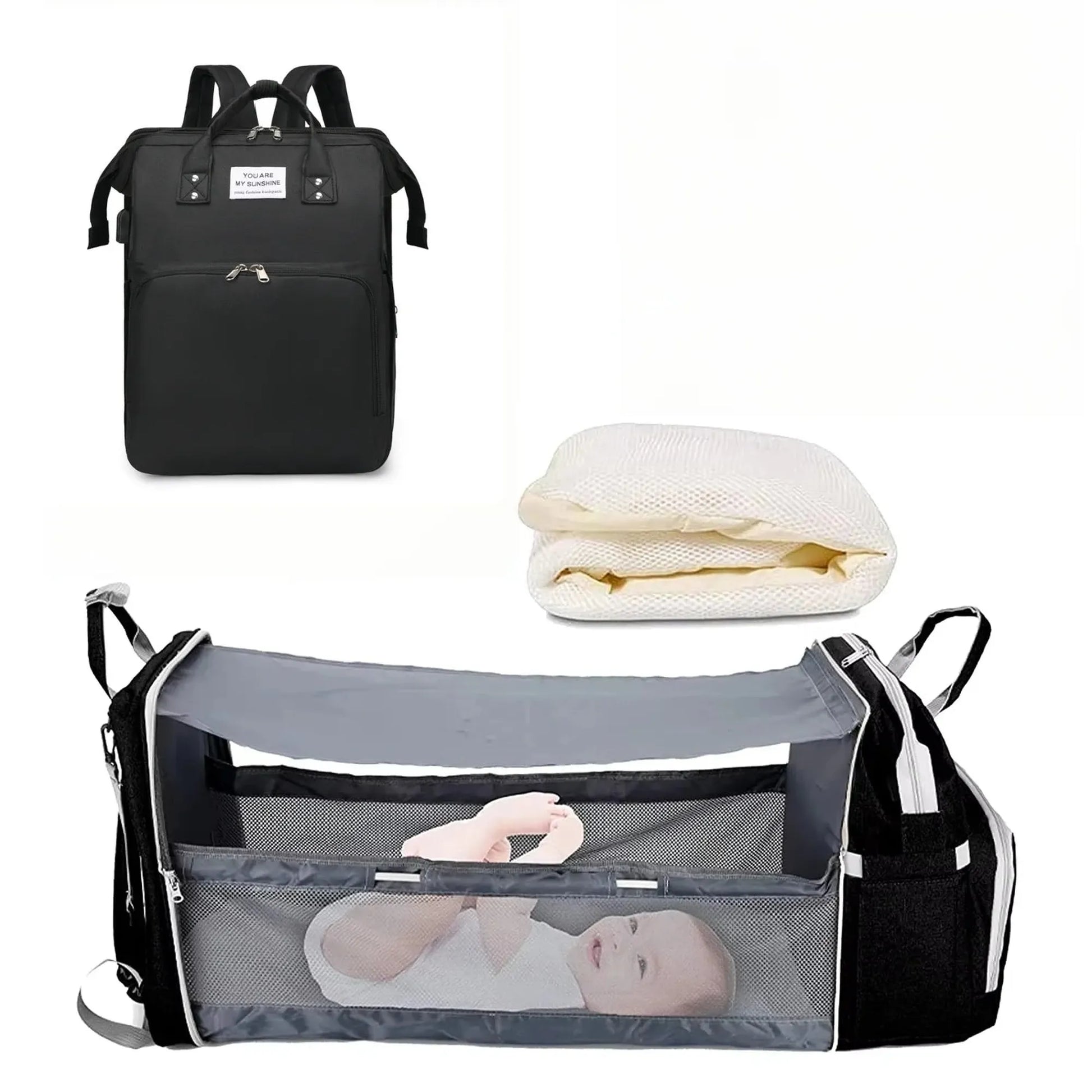 Black 3-in-1 diaper backpack with foldable baby bed, changing station, and mesh liner.