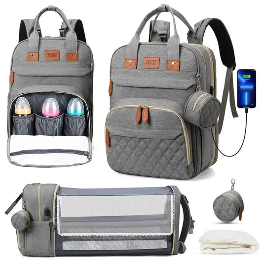 Gray 3-in-1 diaper bag backpack with foldable bed, changing station, insulated pockets, and USB charging.