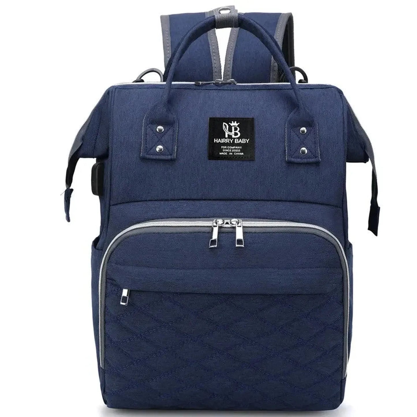Navy blue Oxford fabric diaper backpack with quilted front pocket, top handles, and stroller straps.