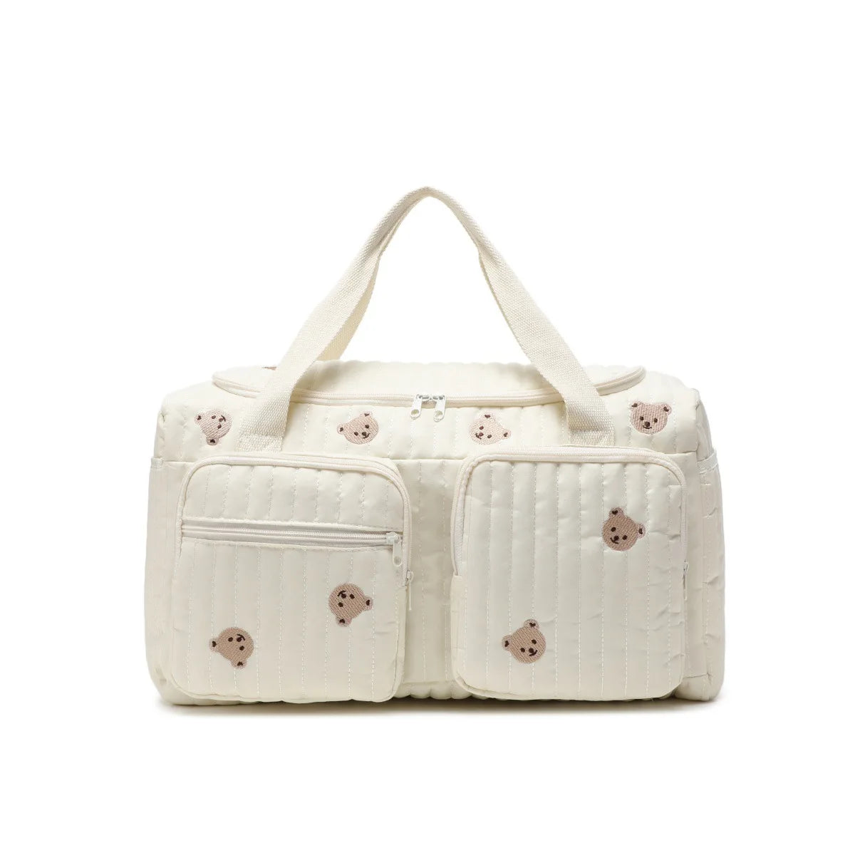 Quilted cotton diaper bag in cream with embroidered teddy bears, zipper closure, and front pockets.