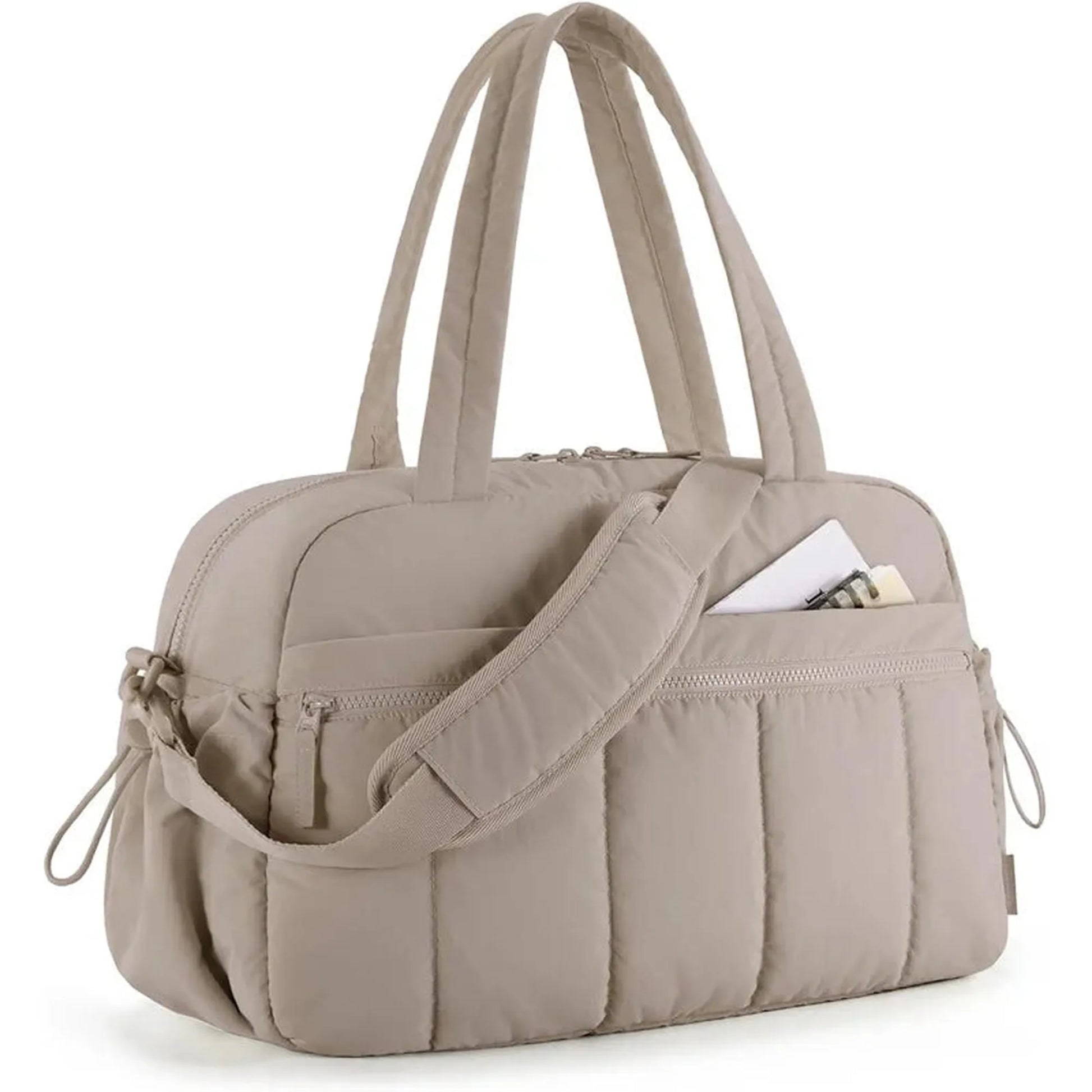 Beige waterproof nylon diaper bag with top handles, shoulder strap, and front pockets.