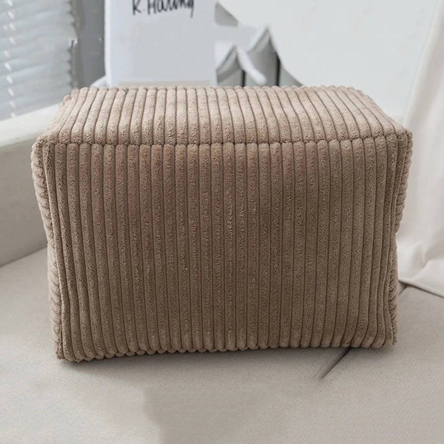 Beige corduroy portable changing pad and organizer with striped design.