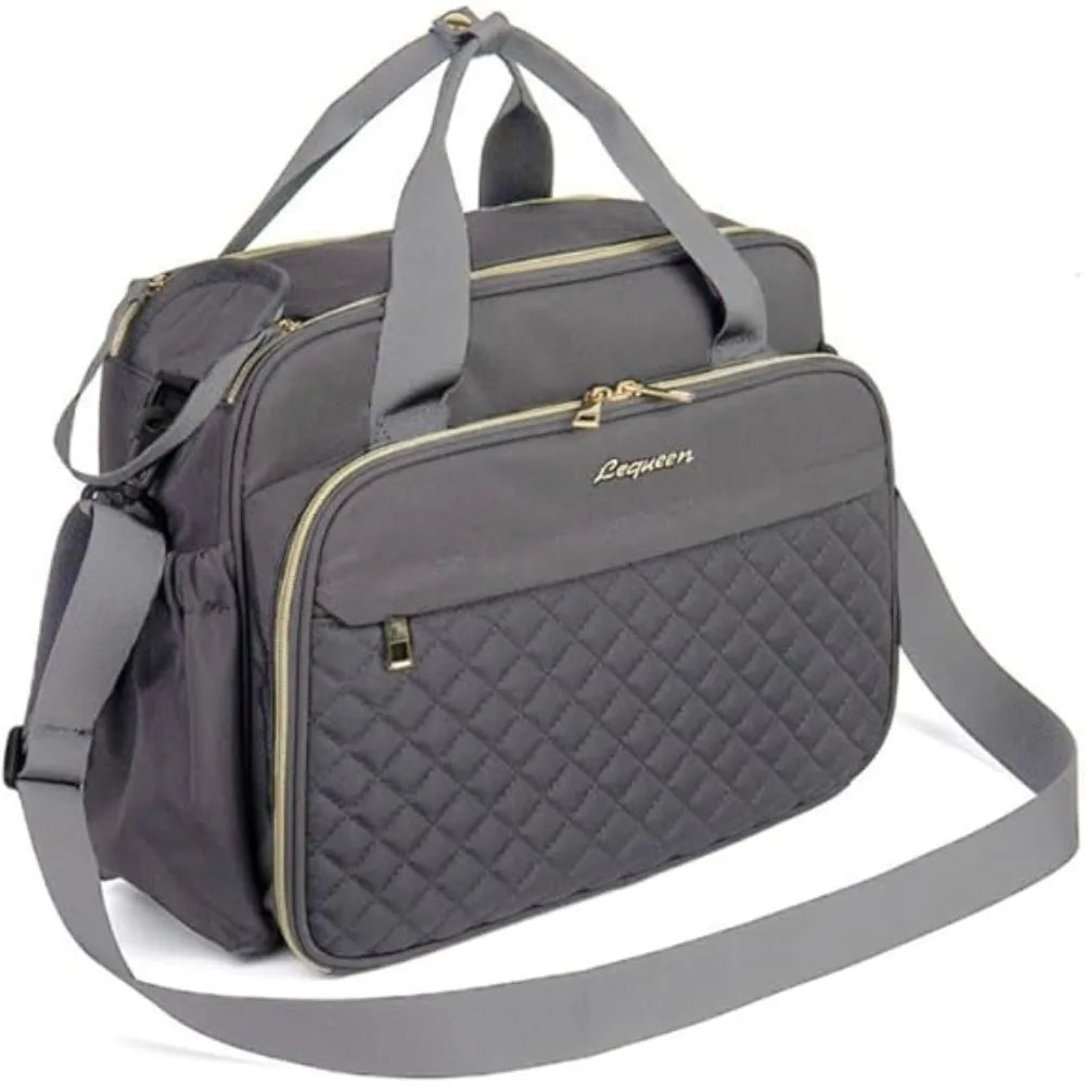 Gray Lequeen diaper bag with quilted front pocket, gold zippers, top handles, and shoulder strap.