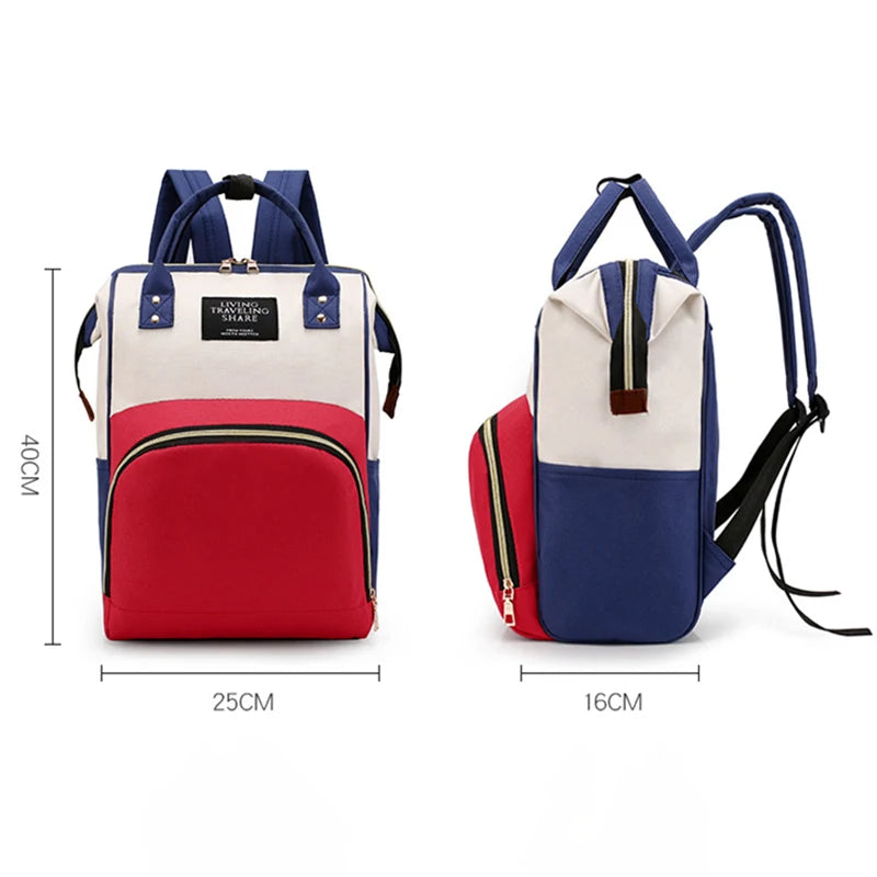 Multifunctional canvas diaper backpack in red, white, and blue with a thermal compartment.