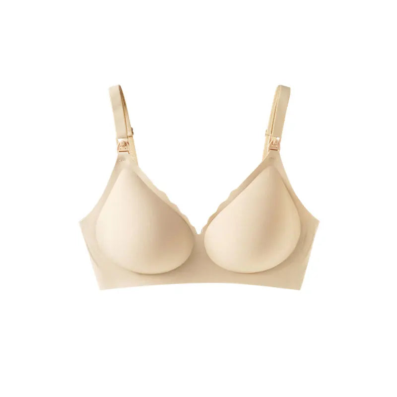 Beige wireless elastic V-neck nursing bra with adjustable straps and removable pads.