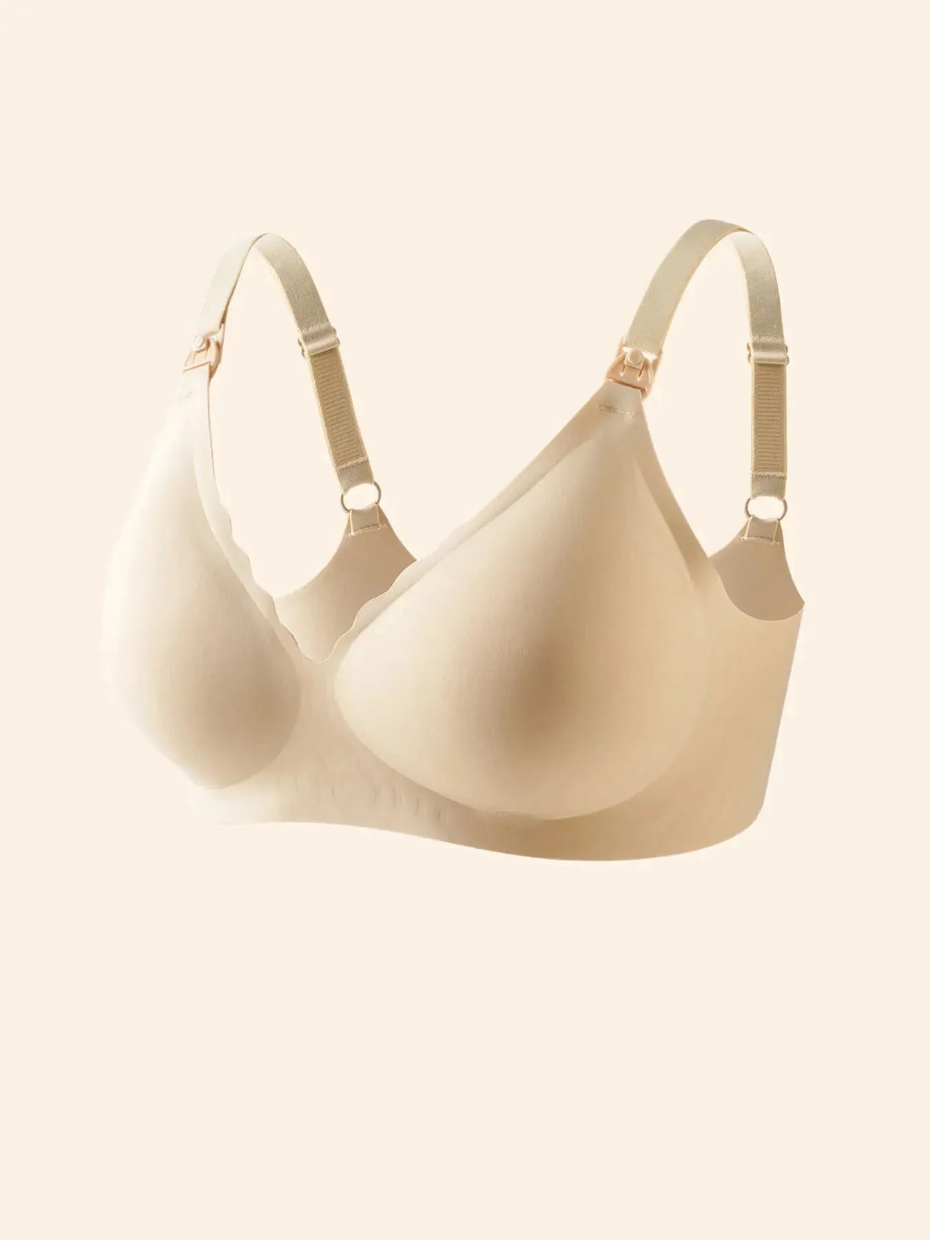 Beige wireless V-neck maternity nursing bra with adjustable straps and easy-open clips.