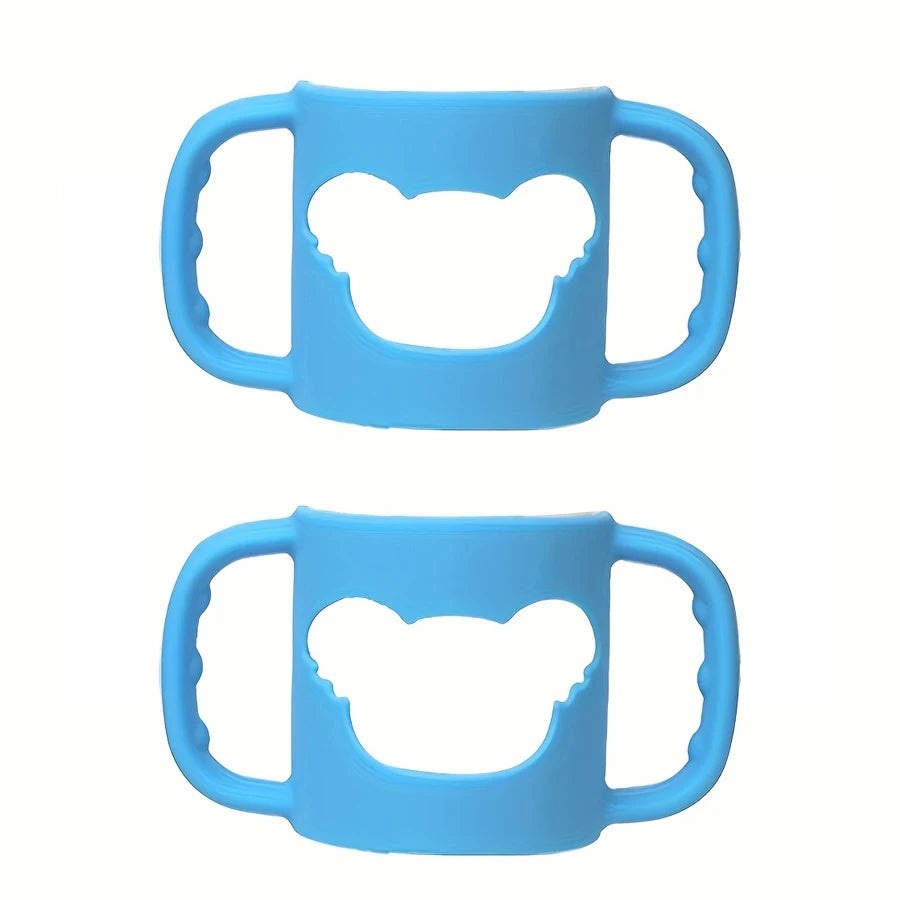 Two blue silicone baby bottle handles with bear-shaped cutouts, designed for easy grip.
