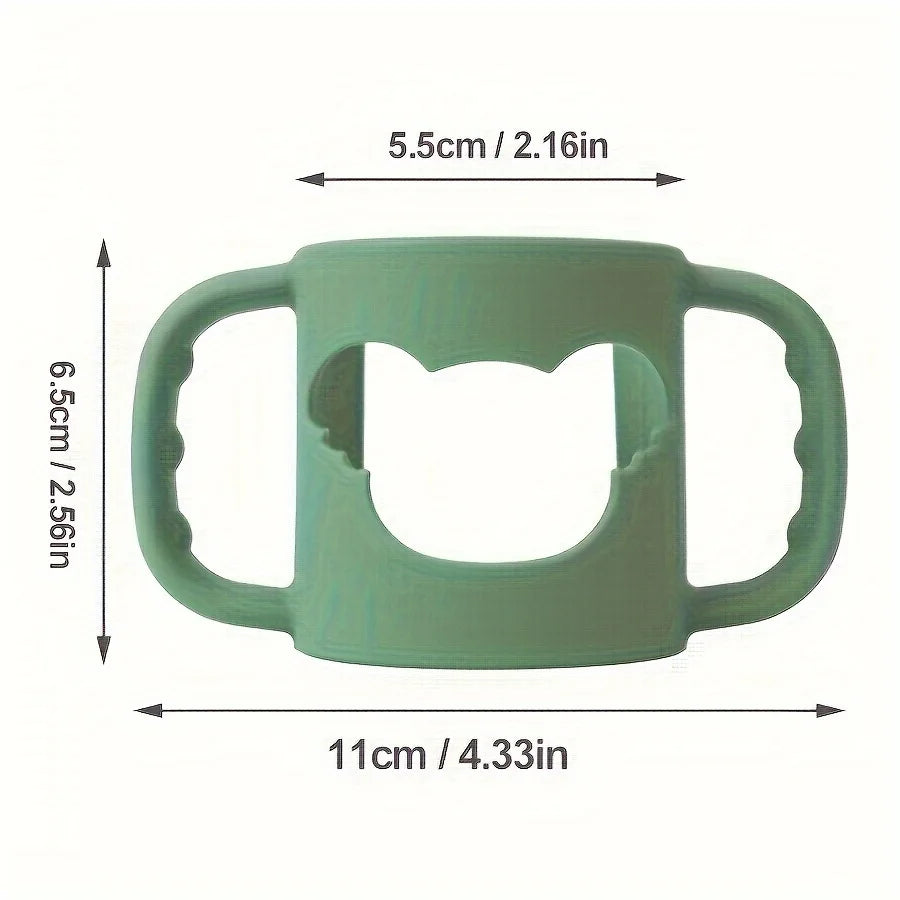 Soft green silicone baby bottle handle with cat-shaped cutout, 11cm wide, for easy gripping.